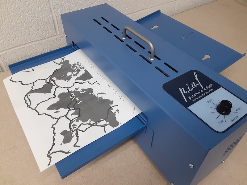 Tectonic plate map being printed on a Pictures in a Flash printer